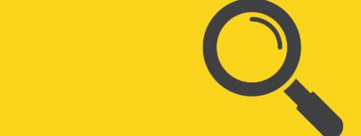 Symbolbild Lupe auf gelbem Hintergrund