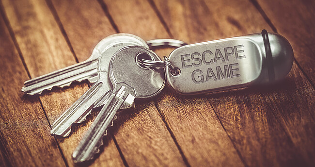 Schlüsselbund mit einem Anhänger beschriftet mit Escapegame