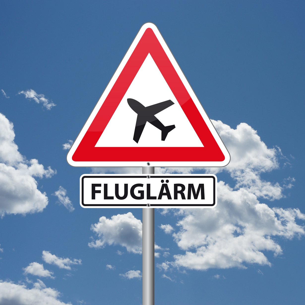 Verkehrsschild mit Flugzeug und dem Schriftzug Fluglärm