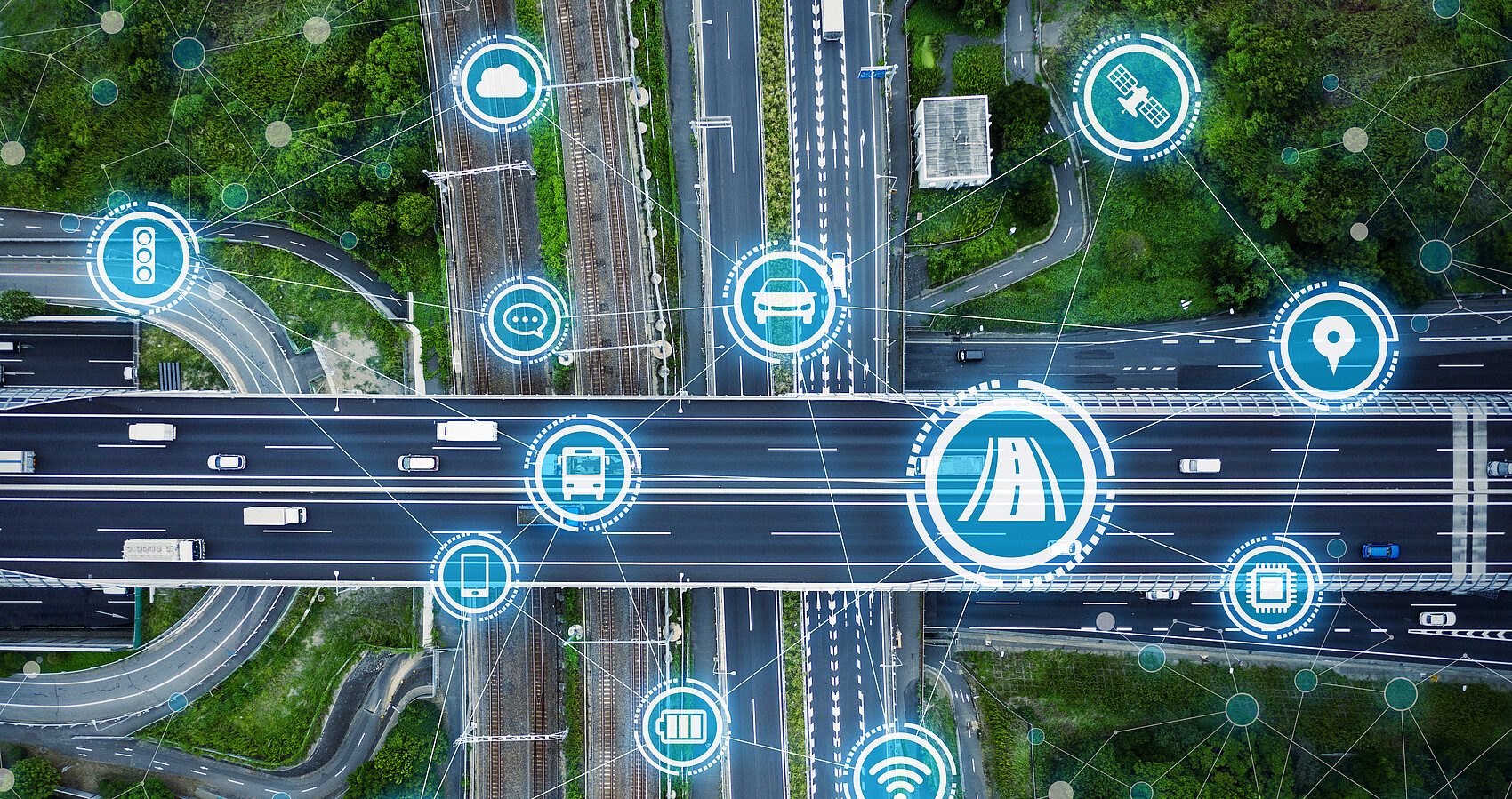 Symbolbilder für die Vernetzung integrierter Verkehrskonzepte sind in ein Luftbild über eine Stadtautobahn eingebunden